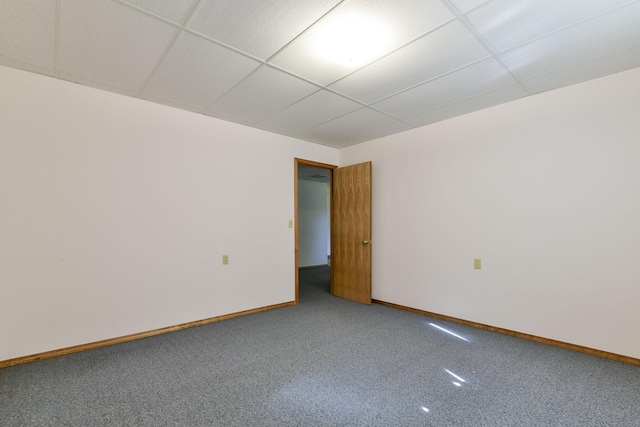 1462 E Powell St, Springfield, MO 65804 - empty room featuring baseboards, carpet flooring, and a paneled ceiling