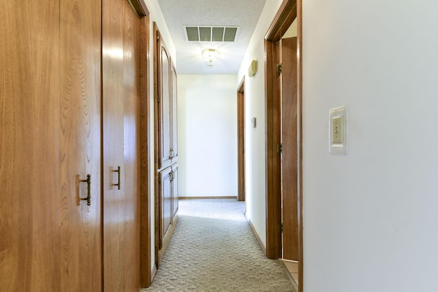 1462 E Powell St, Springfield, MO 65804 - hallway with light carpet and baseboards