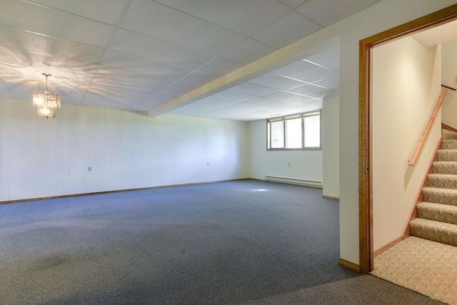 1462 E Powell St, Springfield, MO 65804 - unfurnished room with a baseboard radiator, carpet floors, stairs, a chandelier, and baseboards