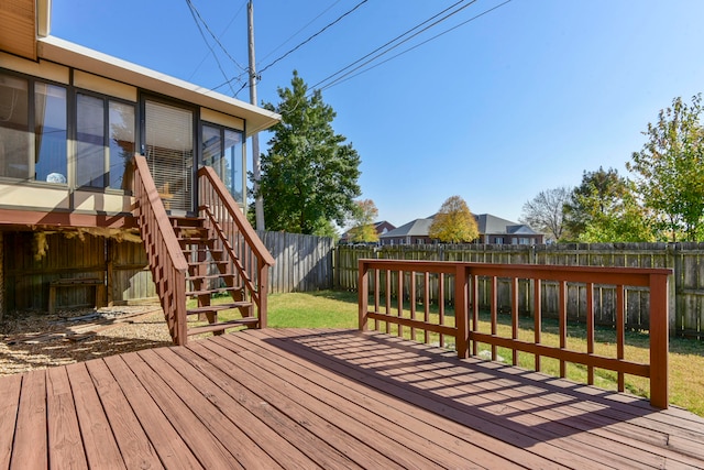 deck featuring a lawn