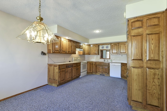 1462 E Powell St, Springfield, MO 65804 - kitchen featuring white appliances, brown cabinetry, carpet, a chandelier, and a textured ceiling