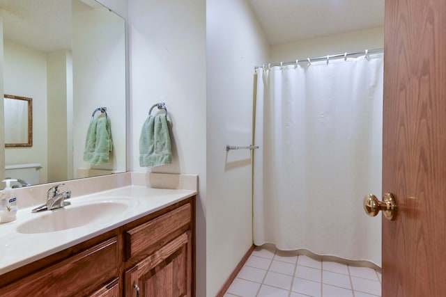 bathroom with vanity and tile patterned floors