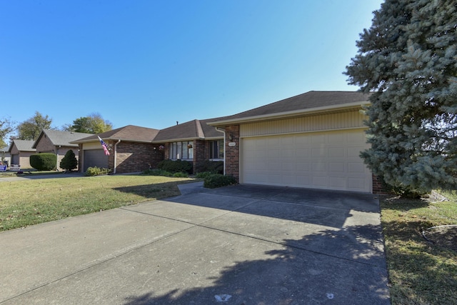 1462 E Powell St, Springfield, MO 65804 - ranch-style home with an attached garage, brick siding, driveway, and a front lawn