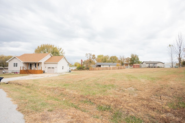 view of yard with a garage