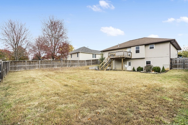 view of yard featuring a wooden deck