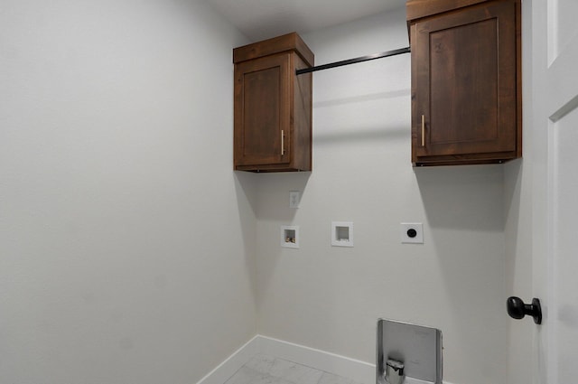 laundry area featuring hookup for a washing machine, cabinets, and hookup for an electric dryer