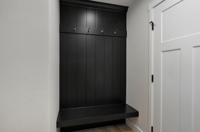 mudroom with hardwood / wood-style flooring