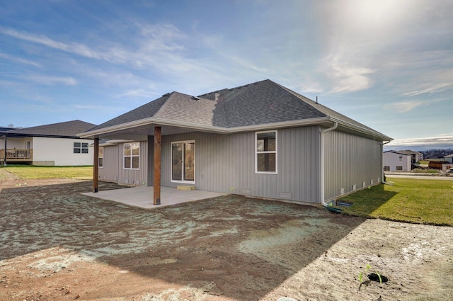 back of property with a patio area