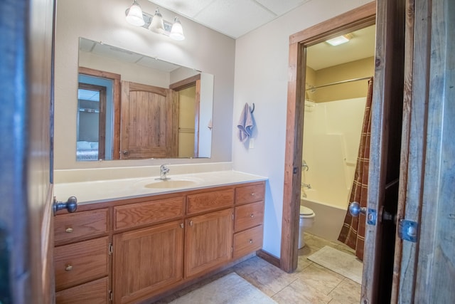 full bathroom with toilet, shower / tub combo with curtain, vanity, and tile patterned floors