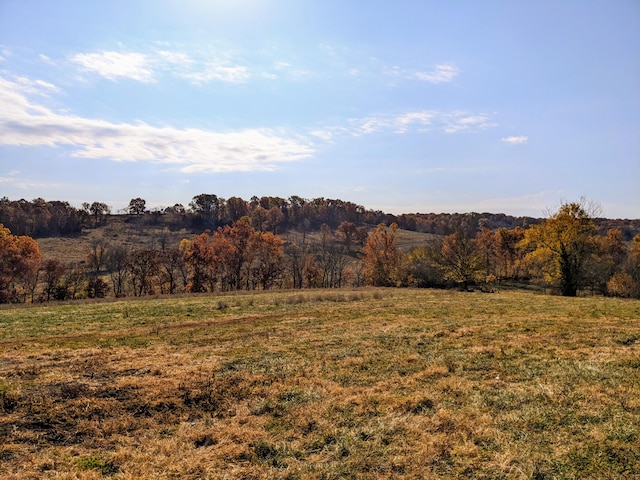 view of mountain feature with a rural view