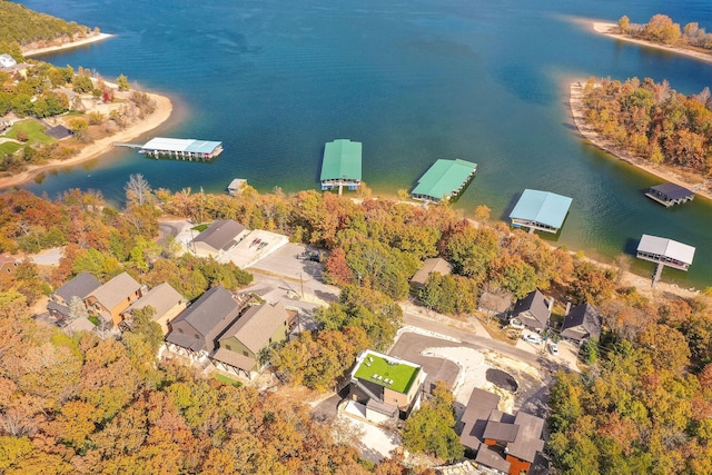 birds eye view of property featuring a water view and a residential view