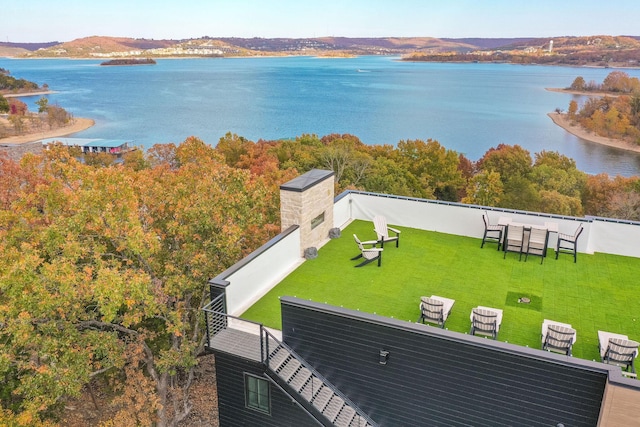 drone / aerial view featuring a water view