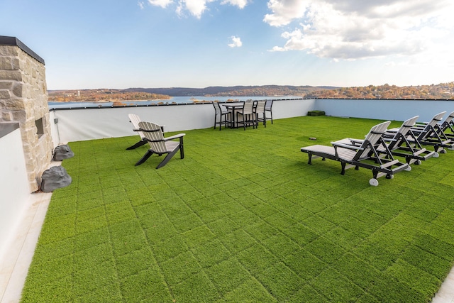 view of yard with a water view