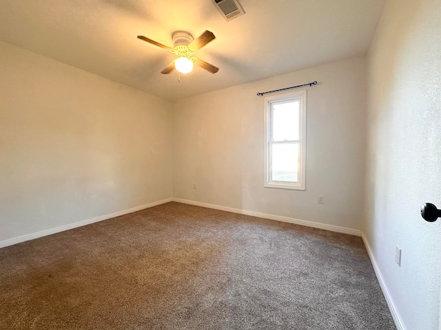 empty room featuring carpet and ceiling fan