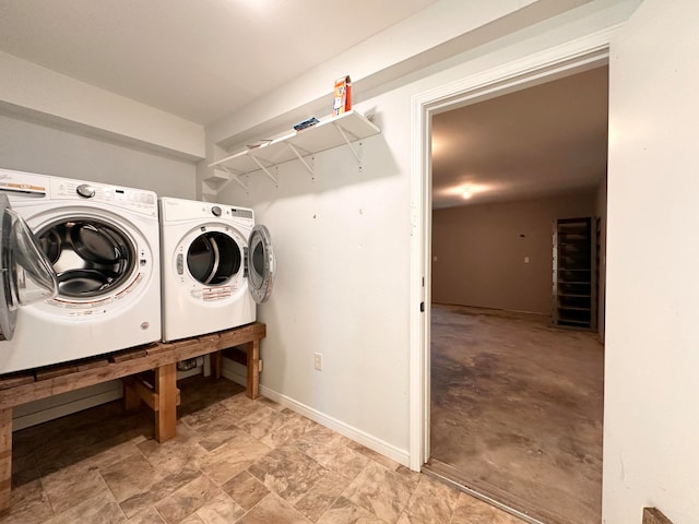 laundry room featuring separate washer and dryer