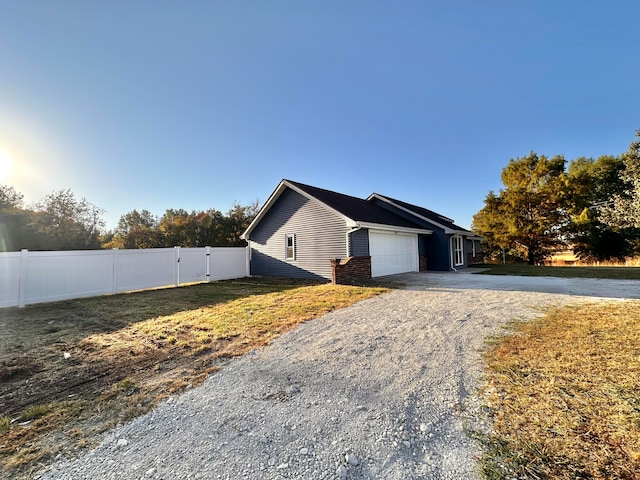 view of home's exterior with a garage