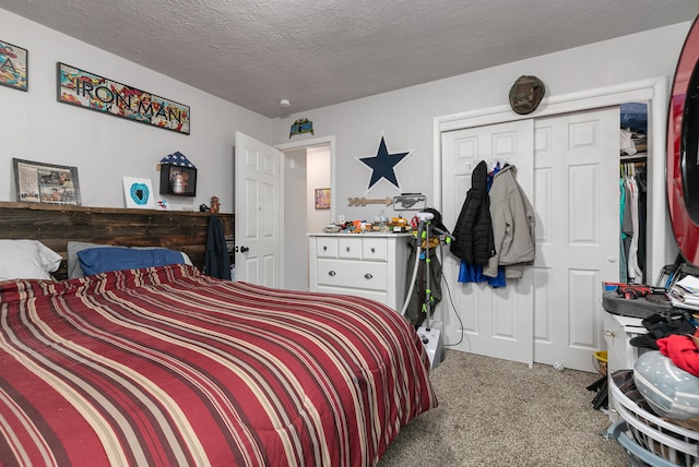 bedroom with carpet, a textured ceiling, and a closet