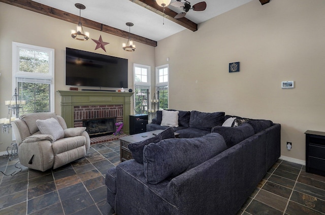 living room with high vaulted ceiling, beamed ceiling, plenty of natural light, and a fireplace