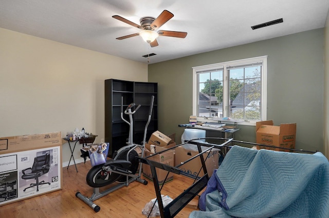 office area with hardwood / wood-style floors and ceiling fan