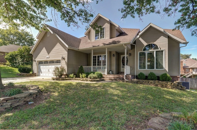 view of front of property with central air condition unit, a front lawn, and covered porch