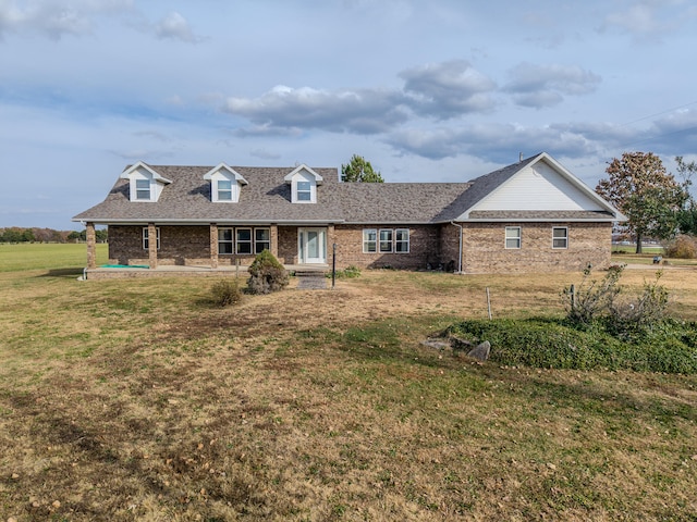 view of front of home with a front yard