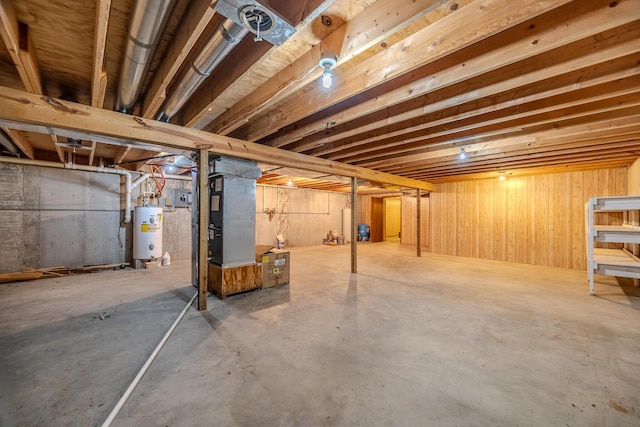 unfinished below grade area with water heater and heating unit