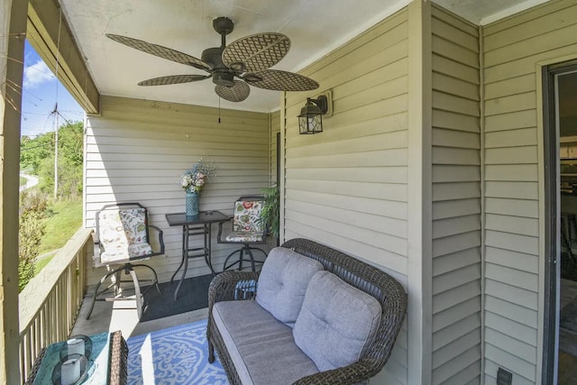 exterior space featuring ceiling fan