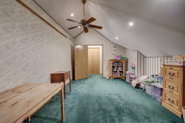 interior space with ceiling fan, a textured ceiling, carpet flooring, and lofted ceiling