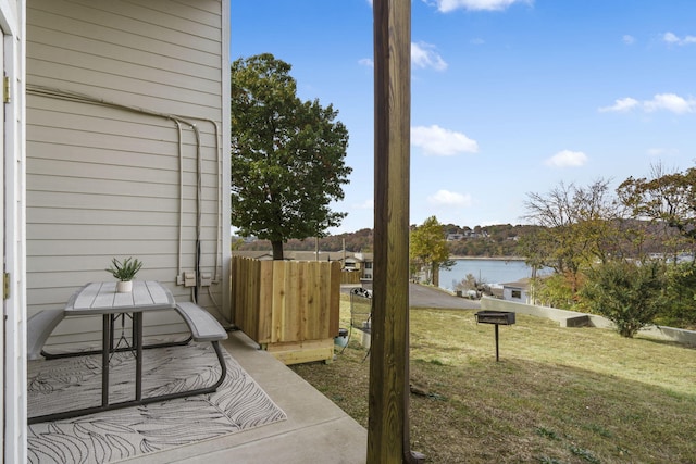 exterior space with a water view