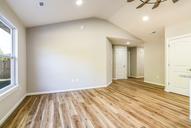 unfurnished room with lofted ceiling, light hardwood / wood-style flooring, and ceiling fan