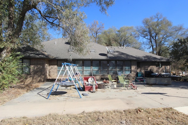 1819 Pleasant Hill Rd, Seymour, MO 65746 - rear view of property featuring brick siding and roof with shingles