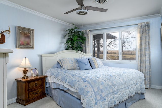 bedroom with light carpet, ornamental molding, and ceiling fan