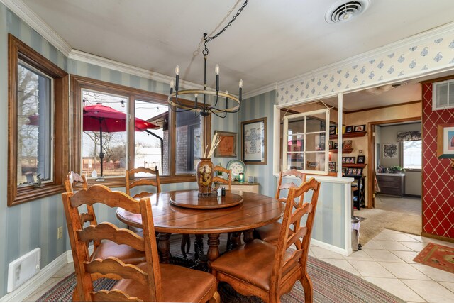 15778 Lawrence Unit 2130, Mount Vernon, MO 65712 - dining area with a chandelier, wallpapered walls, crown molding, light tile patterned floors, and baseboards