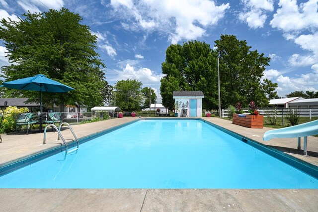 15778 Lawrence Unit 2130, Mount Vernon, MO 65712 - view of pool featuring a water slide, fence, and a patio