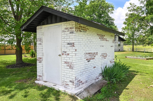 15778 Lawrence Unit 2130, Mount Vernon, MO 65712 - view of shed with a vegetable garden