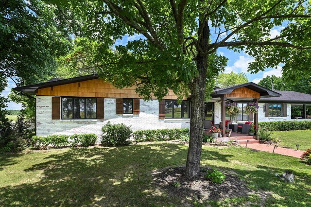 15778 Lawrence Unit 2130, Mount Vernon, MO 65712 - view of front of property featuring brick siding and a front lawn