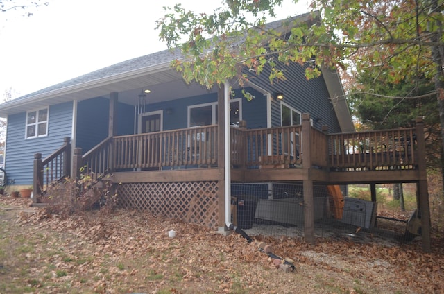4435 Olga Rd, Fordland, MO 65652 - rear view of house with central AC and covered porch
