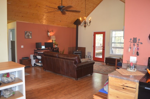 4435 Olga Rd, Fordland, MO 65652 - living area featuring a wood stove, high vaulted ceiling, hardwood / wood-style flooring, wooden ceiling, and a ceiling fan