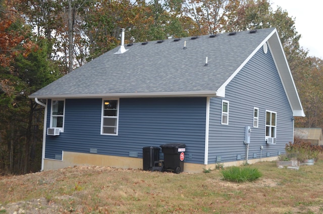 4435 Olga Rd, Fordland, MO 65652 - back of property with a shingled roof and a yard