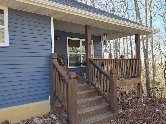 doorway to property with covered porch