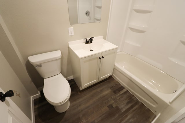 full bathroom with vanity, toilet, shower / tub combination, and hardwood / wood-style floors