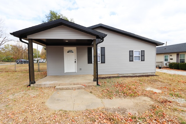 bungalow-style home with covered porch