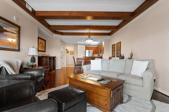 250 Lakewood Dr Unit 6303, Hollister, MO 65672 - living room with wood finished floors, beamed ceiling, and baseboards
