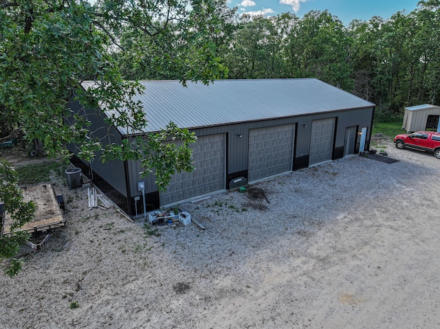 garage featuring central air condition unit