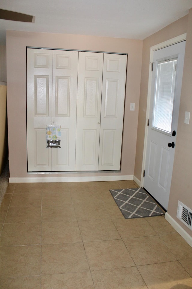 view of tiled entrance foyer