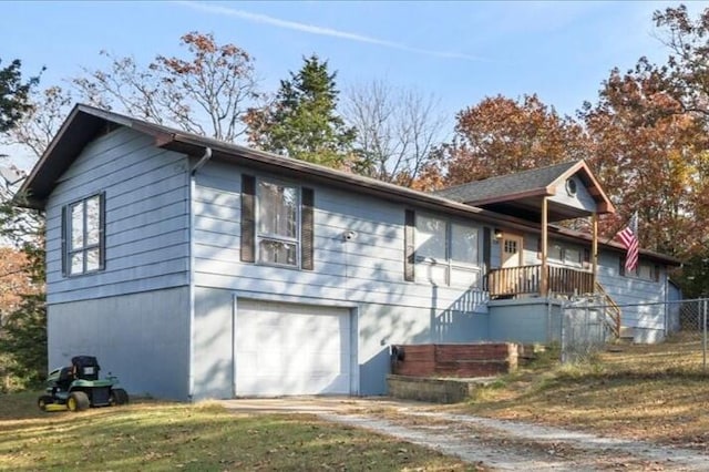 view of side of home featuring a garage