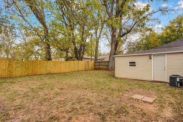 view of yard with central AC unit