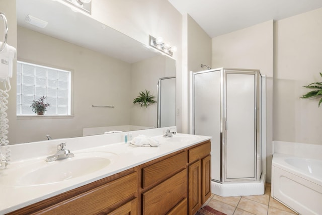 bathroom featuring vanity, separate shower and tub, and tile patterned flooring