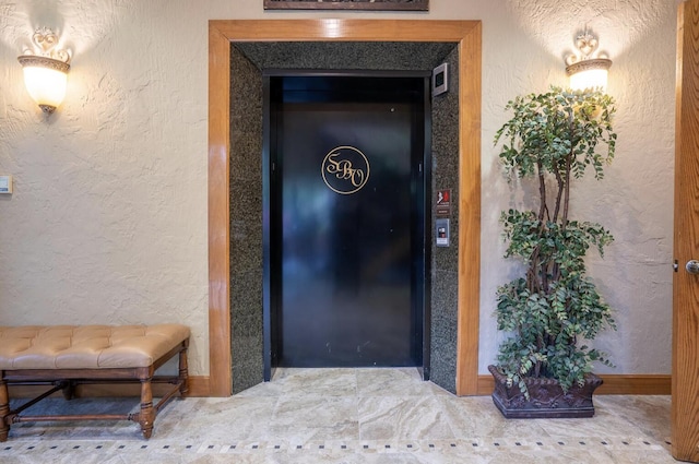 property entrance featuring elevator