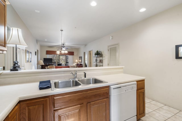 1091 Golf Dr Unit 1, Branson West, MO 65737 - kitchen featuring brown cabinetry, light tile patterned flooring, open floor plan, a sink, and dishwasher